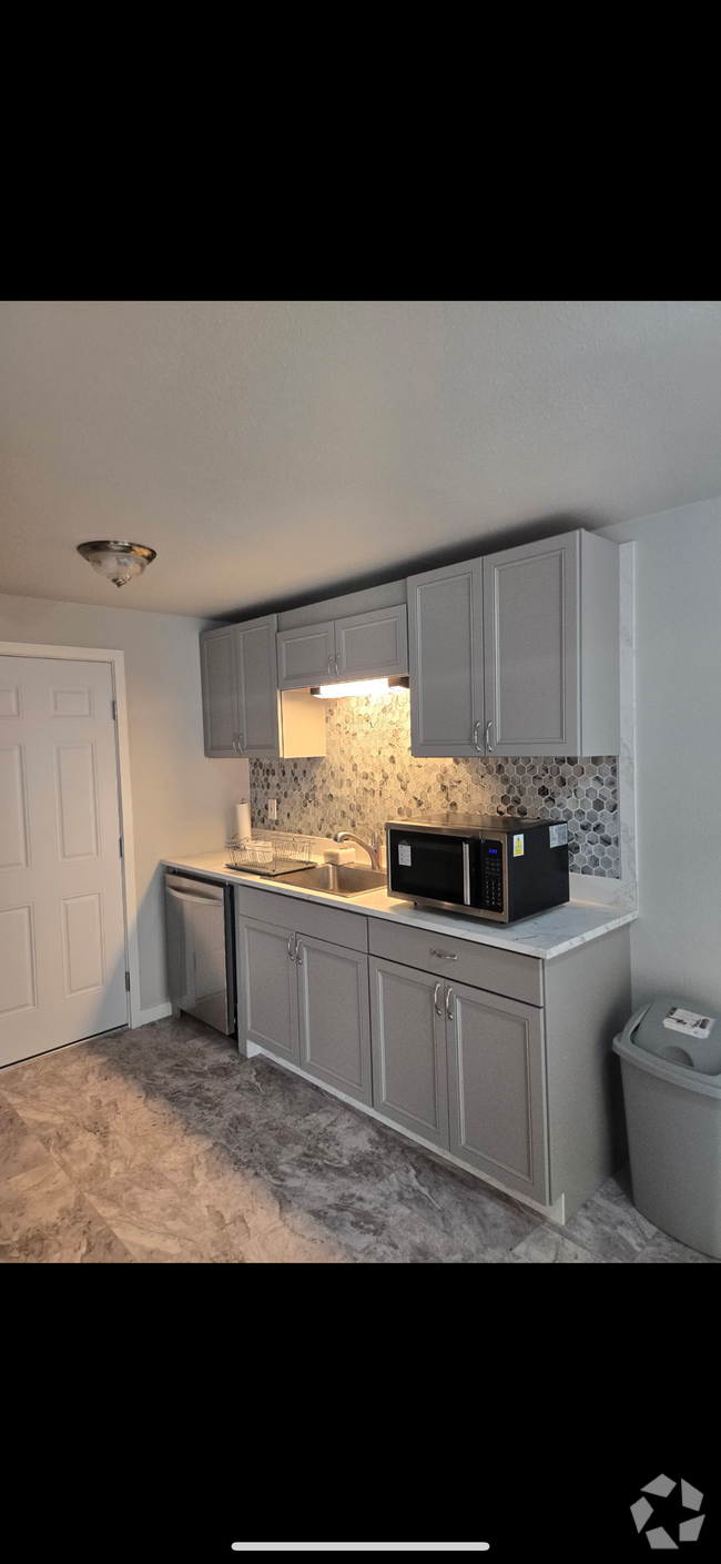 All new cabinets, countertops, and tile backsplash - 1027 172nd St E