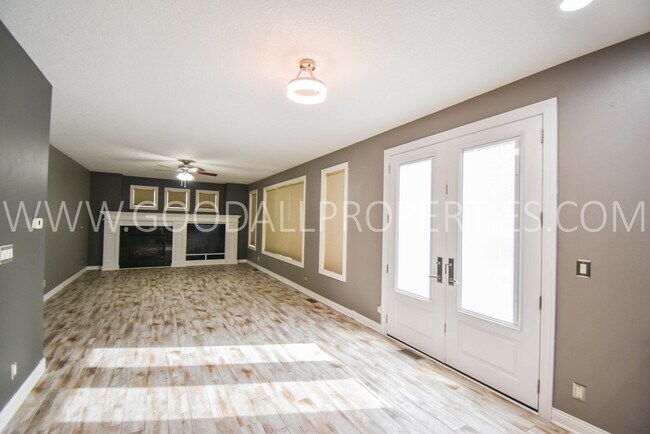 Building Photo - 4 Bedroom 4 Bath Executive Home in West Des Moines with a fenced in yard and a 3-car garage