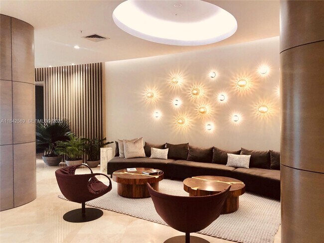 Building Photo - 10275 Collins Ave