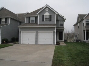 Building Photo - 9806 N Lewis Ave