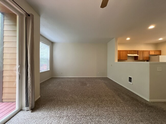 Building Photo - Spacious Three-Story Townhome Near Orenco Station with Attached Garage, Private Balcony, and Vaul...