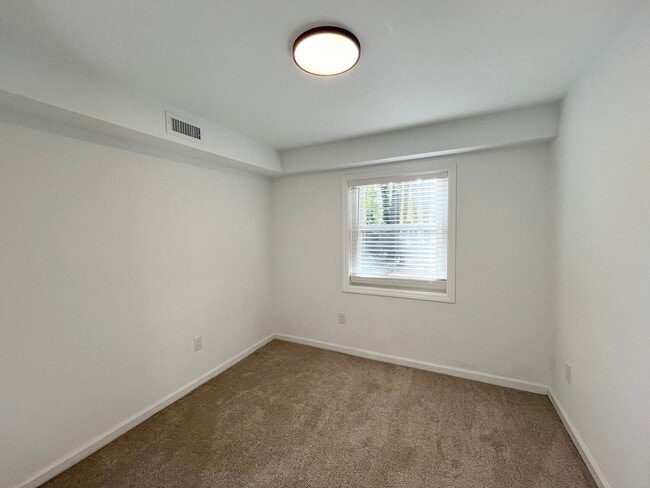 Building Photo - Modern 2BD, 2BA with 3rd Bonus Room Near Downtown Durham with Assigned Off-Street Parking and Bac...