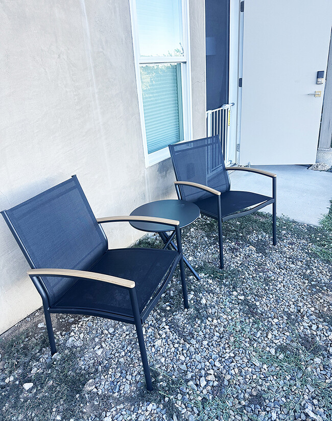 Bistro table and chairs outside. - 7079 Engineers Rd