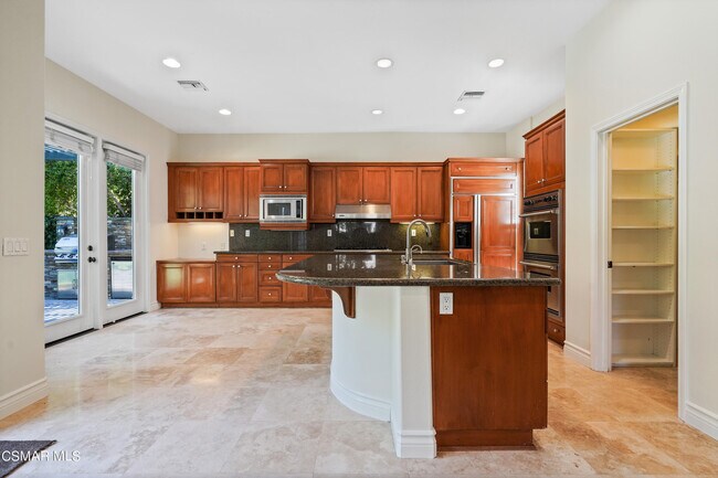 Building Photo - 6077 Mandeville Pl