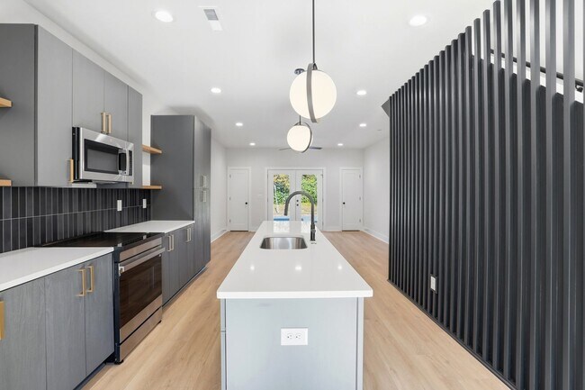 Building Photo - Bishop at Briar Creek, an end-unit townhome