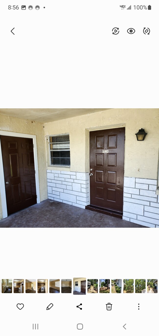 Covered front porch with door to unit And door to utility room - 6534 West Norvell Bryant Highway