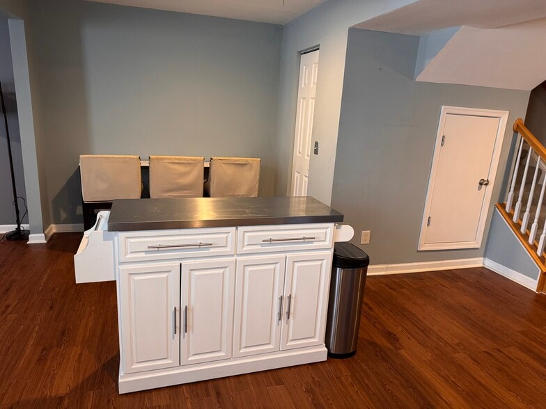 The island is mobile around the space. - 7837 Heaton Way