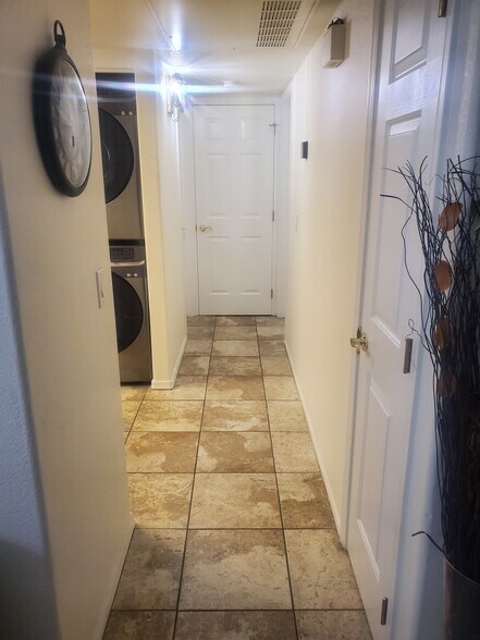 Hallway Leading To Bathroom (Left Side) & Bedroom (Right Side). Storage Closet Is Straight Ahead. - 2095 Mesquite Ave