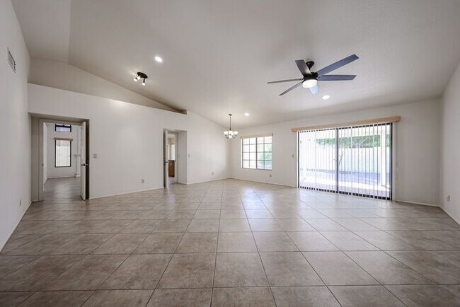 Building Photo - Welcome to this stunning 4-bedroom, 2-bath...