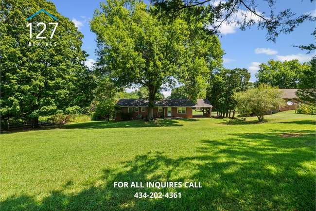 Building Photo - Spacious 4-Bedroom Home with Dual Kitchens...