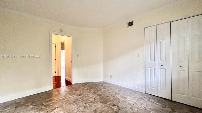 Building Photo - 303 Gardens Dr