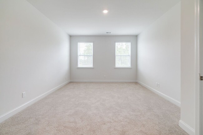 Building Photo - Beautiful 4BR Home in Woodland Trail – Top...