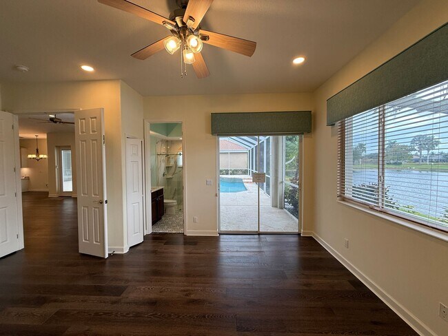 Building Photo - Luxurious 4 Bedroom 3 Bath Lakefront Pool Home W/3-Car Garage