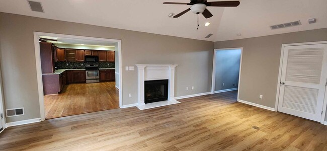 Living room fireplace - 4108 Saratoga Woods Dr