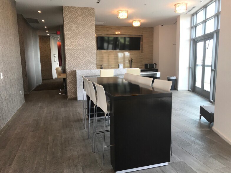 Rooftop community dining area - 460 New York Ave NW