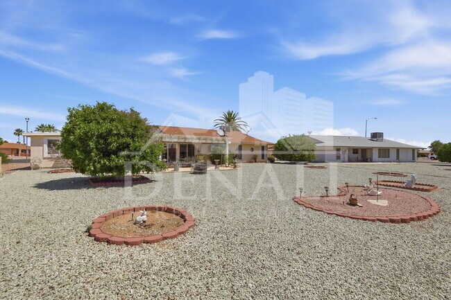 Building Photo - 9807 W Mockingbird Dr