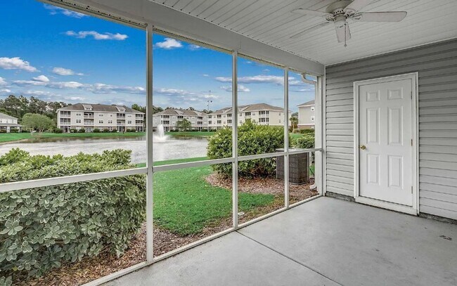 Building Photo - Relax and Unwind in this Spacious End-Unit...
