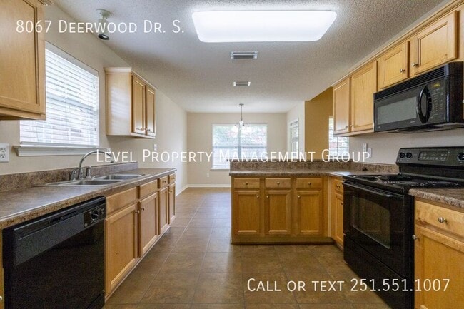 Building Photo - 8067 Deerwood Dr