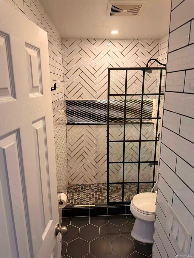 Building Photo - 55-12 Main St