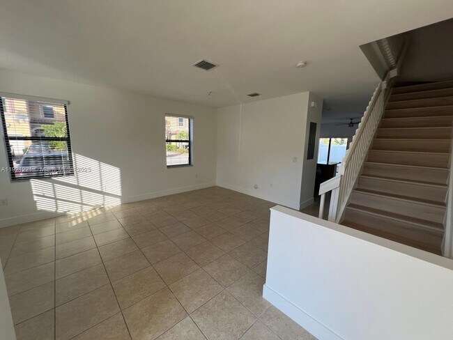 Building Photo - 9399 W 33rd Ln