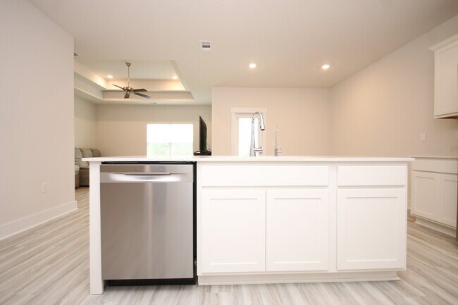Building Photo - Don’t Miss This 4BR Avalon Home — Modern Interior, Open Floor Plan & Access to Pool, Volleyball &...