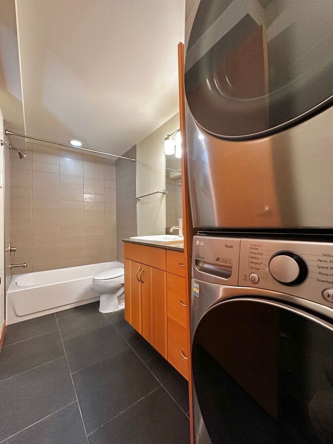 Building Photo - Three-Level Loft-Style 2BR | 3BA with Priv...