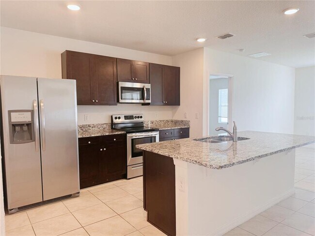 Building Photo - 1805 Rain Lily Pl
