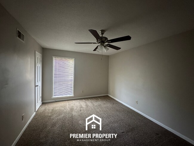 Building Photo - Gorgeous 4BR/2BA Bartlett Home with Brick Fireplace & Spacious Fenced Yard!