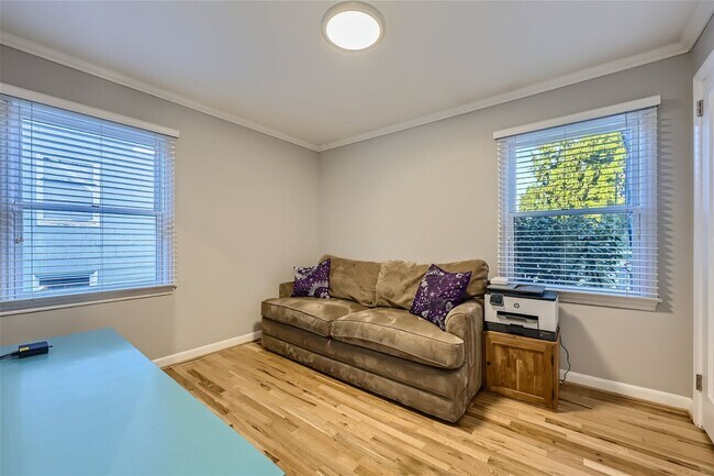Building Photo - Introducing a spacious 4 bedroom, 2.5 bath...