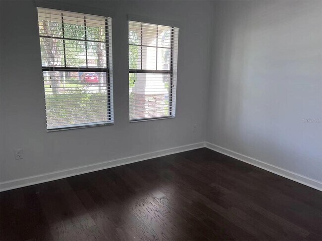 Building Photo - "Spacious 5-Bed Retreat with Elegant Hardwood & Granite Finishes in Tampa – 3 Full Baths & 3264 S...