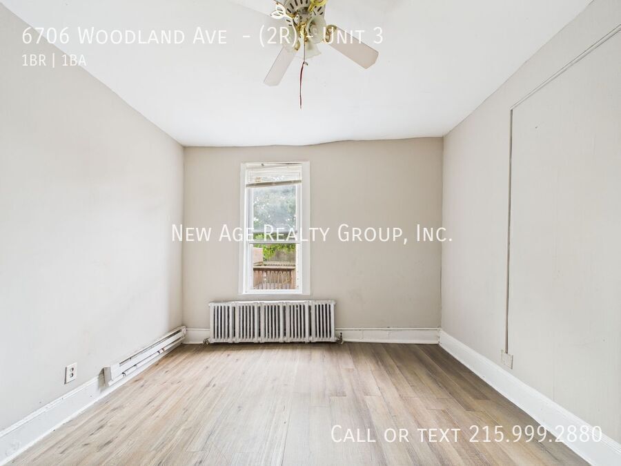 Building Photo - 6706 Woodland Ave