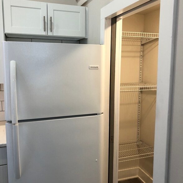 pantry with pocket door - 82 S Main St