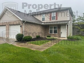 Building Photo - Two Bedroom Townhome with Attached Garage