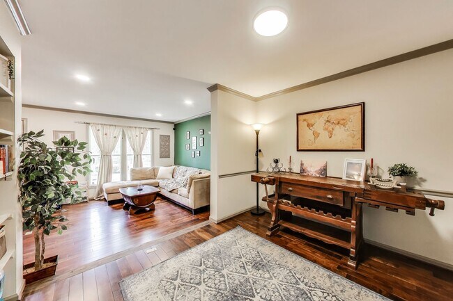 Building Photo - COMINGS SOON - Beautifully Updated Winchester-Built Townhome Backing to Serene Parkland.