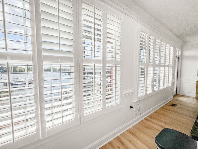 Building Photo - Fully Furnished Waterfront Elegance on Mai...