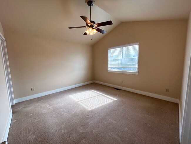 Building Photo - 3-Bedroom Townhome with Double Garage & Private Fenced Yard