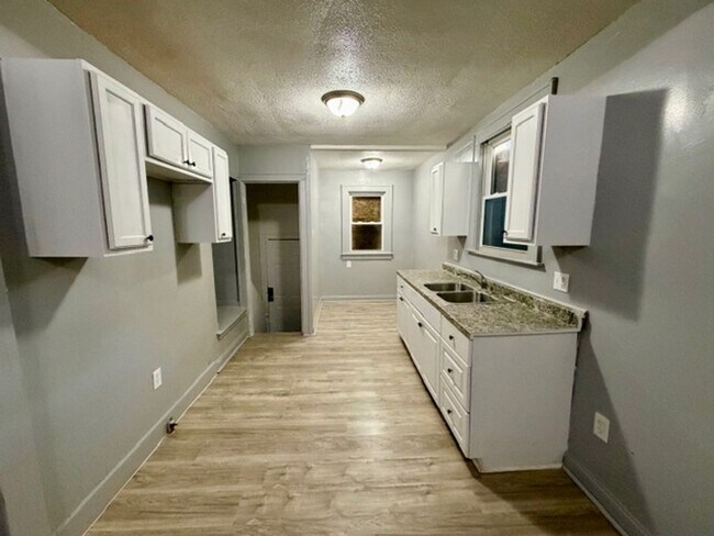 Building Photo - 4 Bedroom 2 Bath Brick Tudor For Lease Wel...