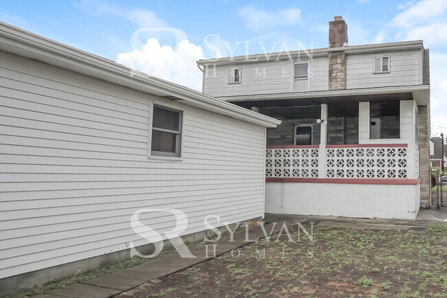 Building Photo - You will love this adorable brick home