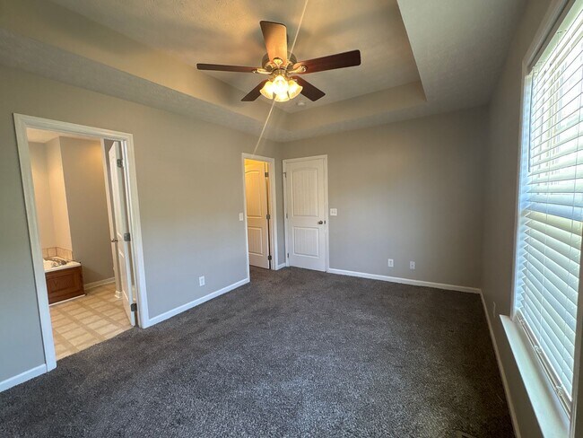 Building Photo - Charming Home with Covered Back Deck and Fenced in Yard...