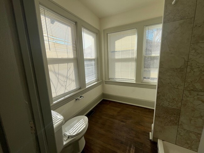 Building Photo - Spacious 4-Bedroom, 2-Bath Home with Porches & Basement