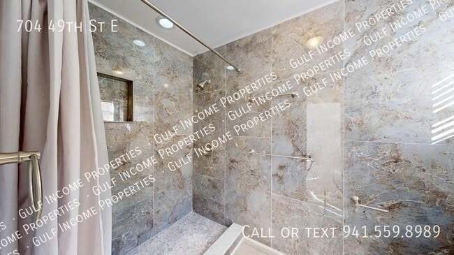 Building Photo - 704 49th St E