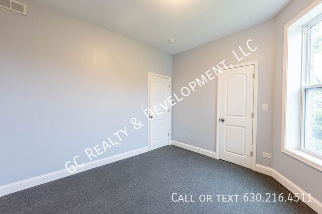 Building Photo - 6433 S Vernon Ave