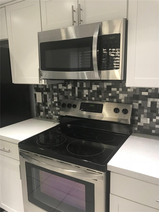 Building Photo - 9576 SW 1st Ct