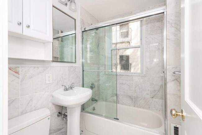 Building Photo - Nicely renovated studio in a prime location near the Green and Orange Line.