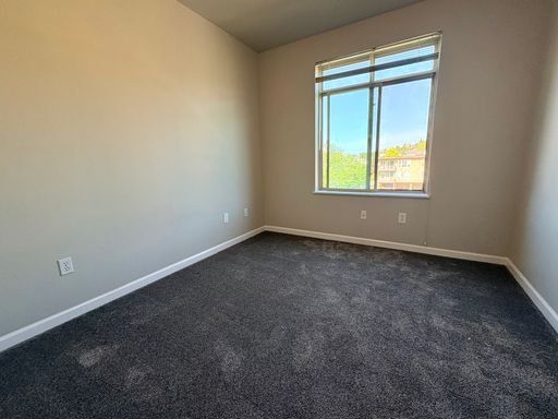 Building Photo - Top-Floor 2BR with Lake Union Views + Garage Parking + Internet Included!