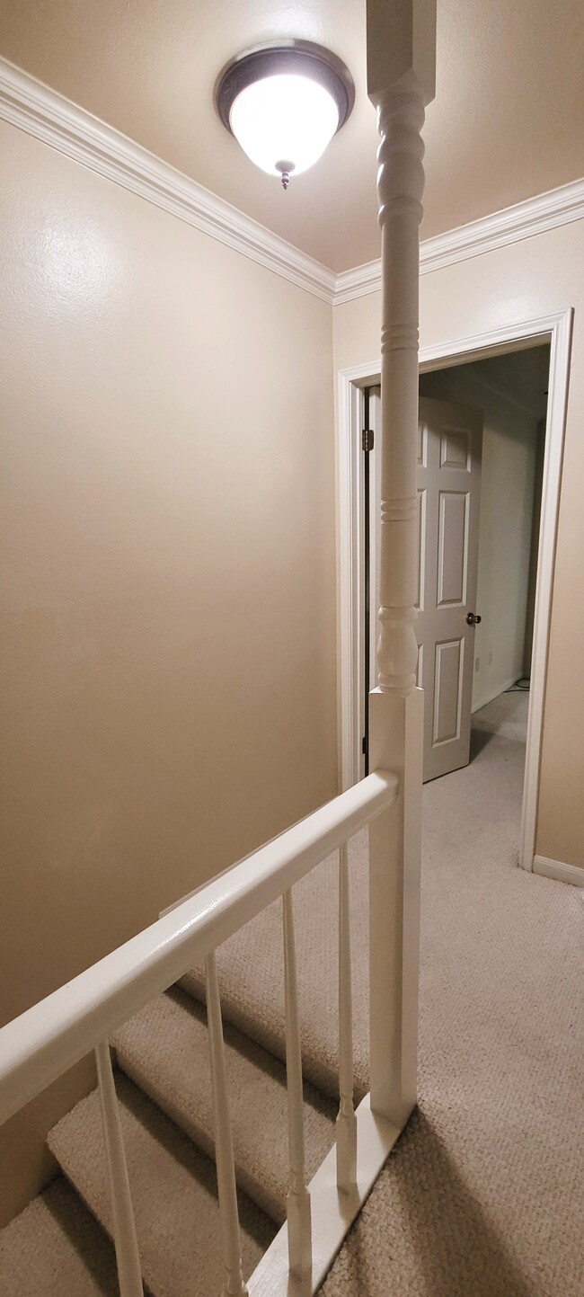 Coming Up The Stairway To the Two Bedrooms (Washer and Dryer Closet Located on the Right) - 416 Doucet Rd