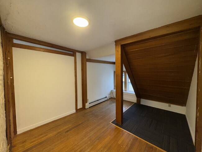 Building Photo - "Charming Studio Gem with Office and Hardwood Floors in the Heart of Minneapolis!"