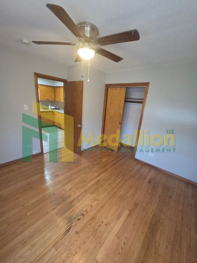 Building Photo - Spacious 6-Bedroom Home with Finished Basement and Backyard