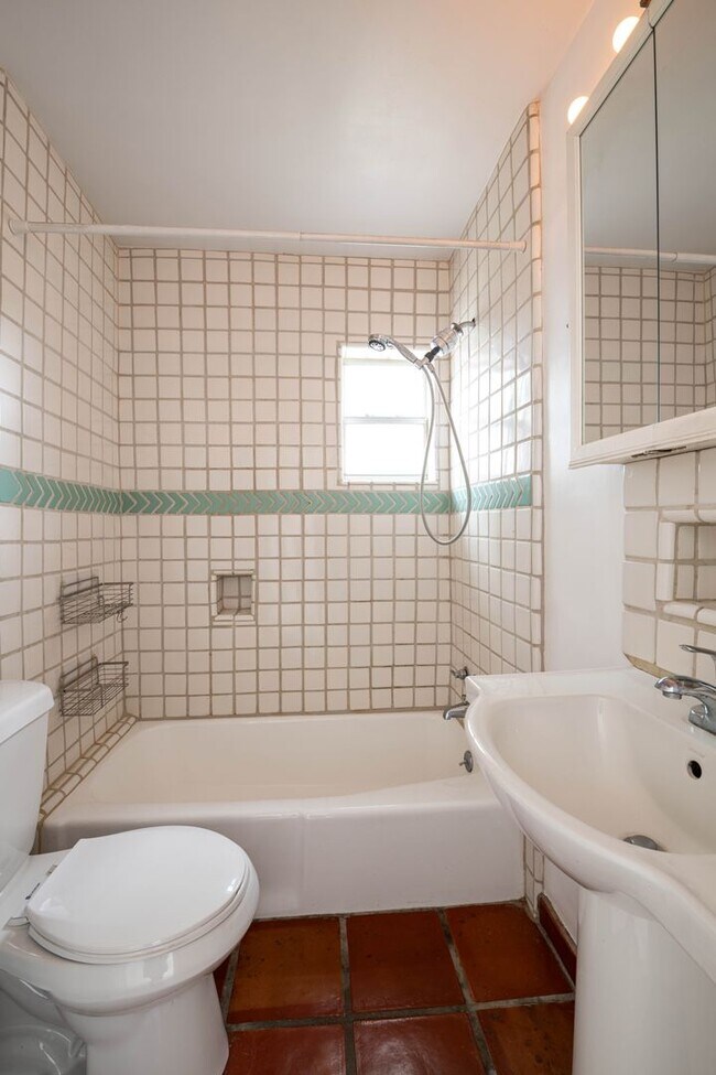 Building Photo - Sunlit One-Bedroom Gem