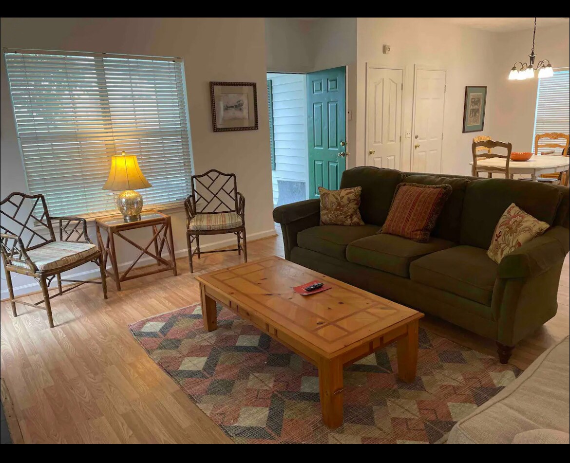 Comfortable living room with flat screen TV and fireplace - 161 Shelby Dr